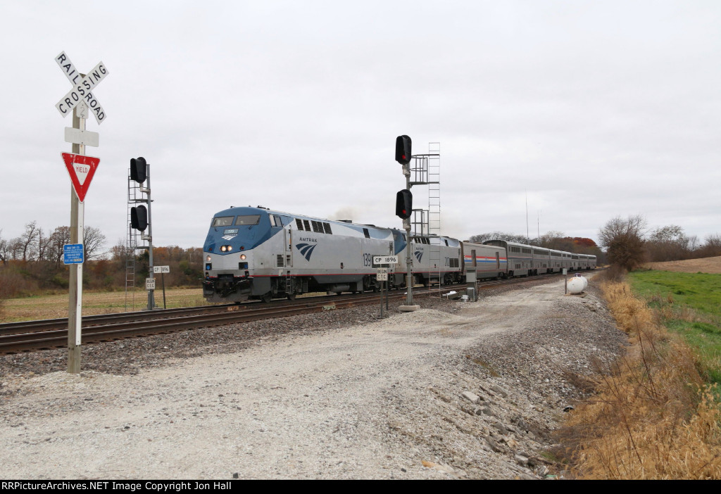 Crossing over to track 2, the eastbound California Zephyr rolls through CP 1896 and in to track warrant territory